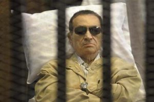 Caged Mubarak in the defendant’s dock