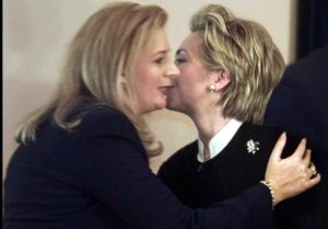 When Suha concluded, Hillary embraced her warmly and planted affectionate kisses on her cheek